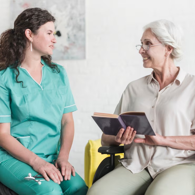 imgi_4_attractive-nurse-looking-senior-woman-patient-sitting-wheel-chair-with-book_23-2147861514 Disability Support Services Fairbanks Alaska<br />
